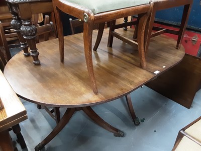 Lot 901 - Regency mahogany twin pedestal dining table