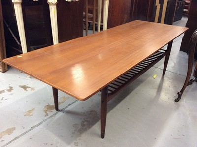 Lot 929 - 1970s G Plan teak coffee table with magazine rack under tier