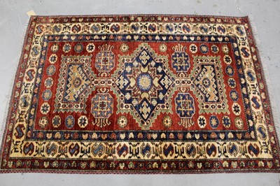 Lot 855 - Good tribal style rug