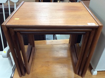 Lot 945 - 1970s teak nest of three occasional tables