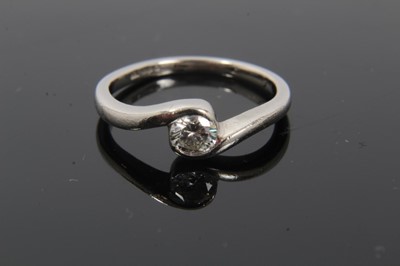 Lot 99 - Diamond single stone ring and half eternity ring