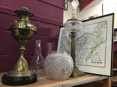 Lot 570 - Two Edwardian oil lamps converted for electricity