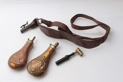 Lot 395 - 19th Century copper powder flask by Dixon & Sons, together with another, a leather shot pouch and a powder dram (4)