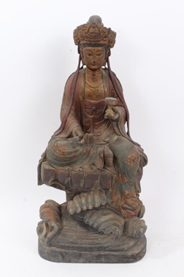 Lot 248 - Antique Chinese carved wood figure of a seated Deity with marks to rear