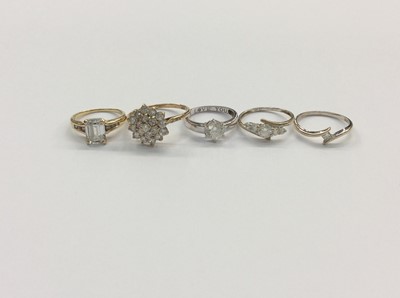 Lot 703 - Five 9ct gold white synthetic stone dress rings