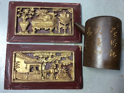 Lot 443 - Two Chinese carved lacquered plaques and Yixing teapot