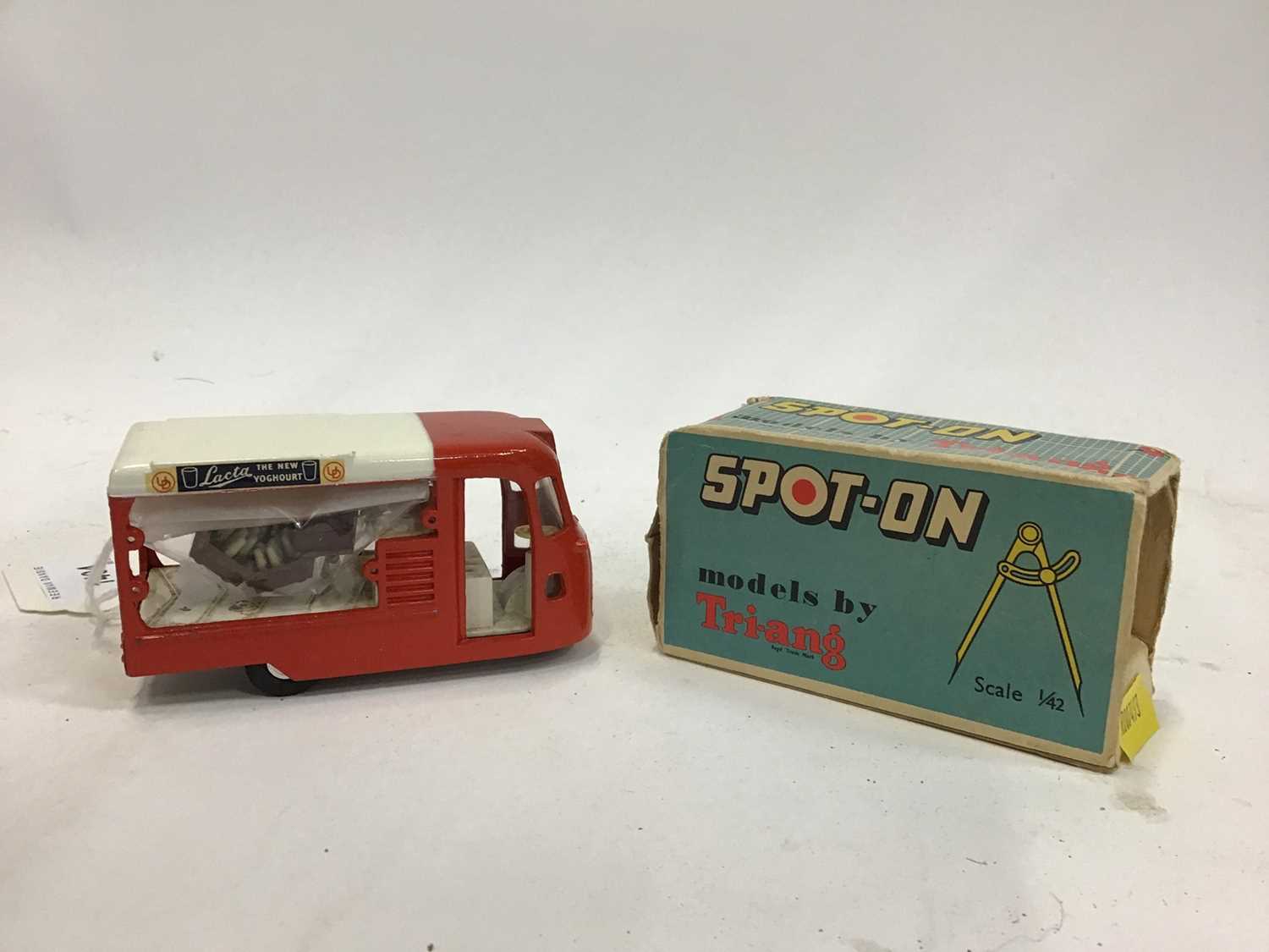 Lot 1404 - Triangle Spot On JD Milk Float in box with accessories.