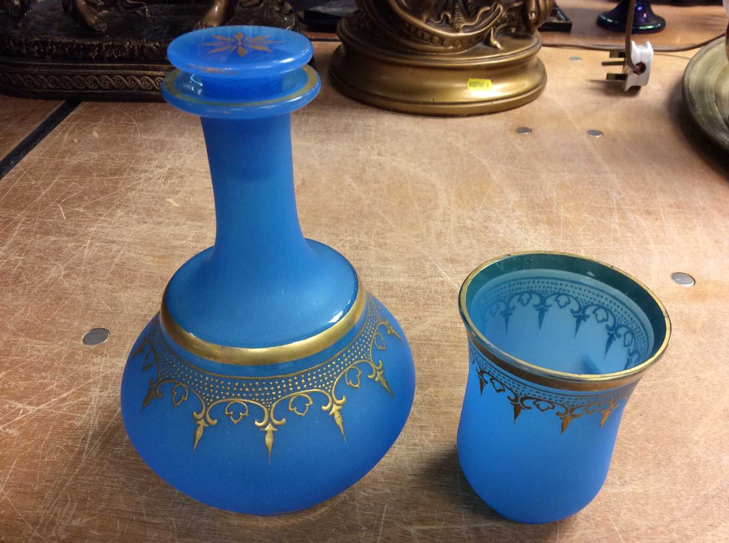 Lot 409 - 19th century Bohemian blue and gilt overlaid glass carafe and beaker