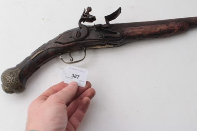 Lot 387 - 19th century Balkan flintlock pistol with brass mounts
