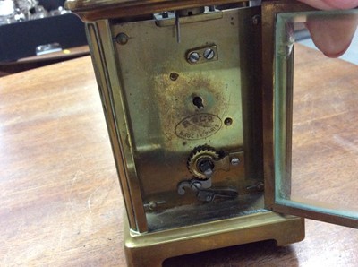Lot 465 - Pair of late Victorian ivory and brass opera glasses engraved 'Mrs Elliot, Exeter 1880', brass cased carriage clock, silver and mother of pearl fruit knife, treen shoe and other items