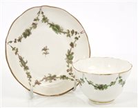 Lot 357 - Bristol-style tea bowl and saucer with green...