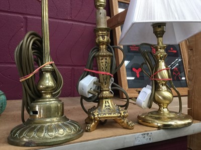 Lot 96 - Antique brass table lamp together with another brass table lamp and a giltwood table lamps (3 lamps)