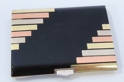 Lot 400 - Art Deco cigarette case, black enamelled with gold and silver inlaid decoration, in the manner of Cartier