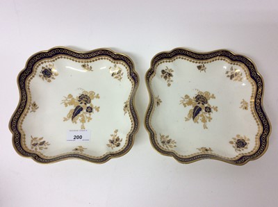 Lot 200 - Pair of Royal Worcester scalloped square dishes with gilt and cobalt blue decoration