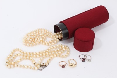 Lot 95 - 14ct gold dolphin ring, 9ct rose gold garnet ring, two other dress rings and two simulated pearl necklaces