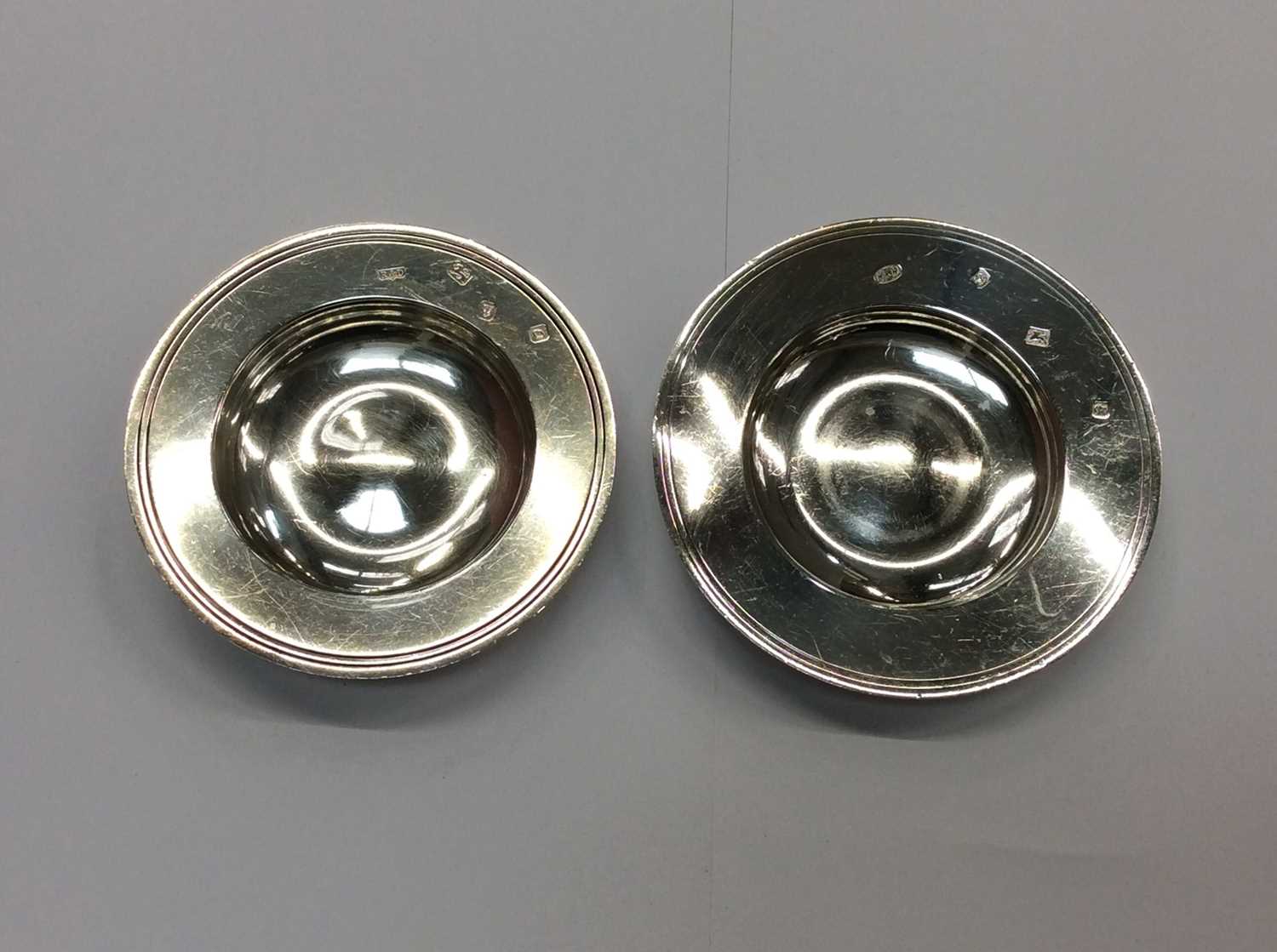 Lot 660 - Two silver armada dishes