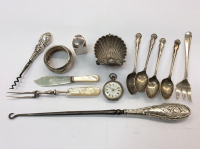 Lot 686 - Group of silver flatware, fob watch and other silver items