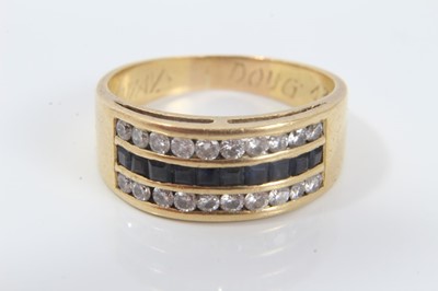 Lot 291 - yellow gold (unmarked) triple row ring set with diamonds and sapphires