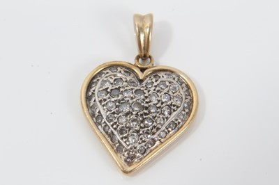 Lot 294 - Heart shaped pendant set with single cut diamonds