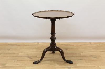 Lot 706 - George III mahogany pie-crust occasional table