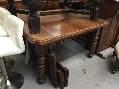 Lot 897 - 19th century walnut extending table with 3 extra leaves and winding handle