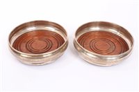 Lot 416 - Pair contemporary silver coasters of circular...