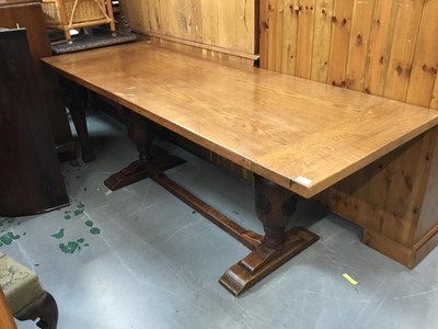 Lot 909 - Large oak drawleaf table in the 17th century style, four carved legs joined by understretchers