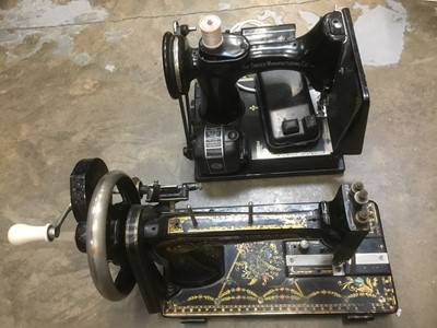 Lot 153 - Two antique sewing machines.