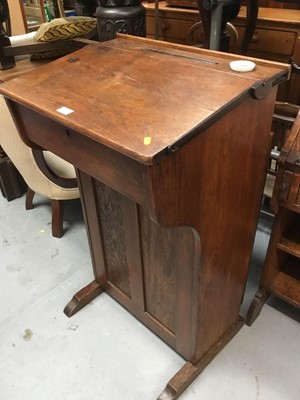 Lot 895 - Late Victorian oak school desk with cupboard to reverse, together with oak tub desk chair