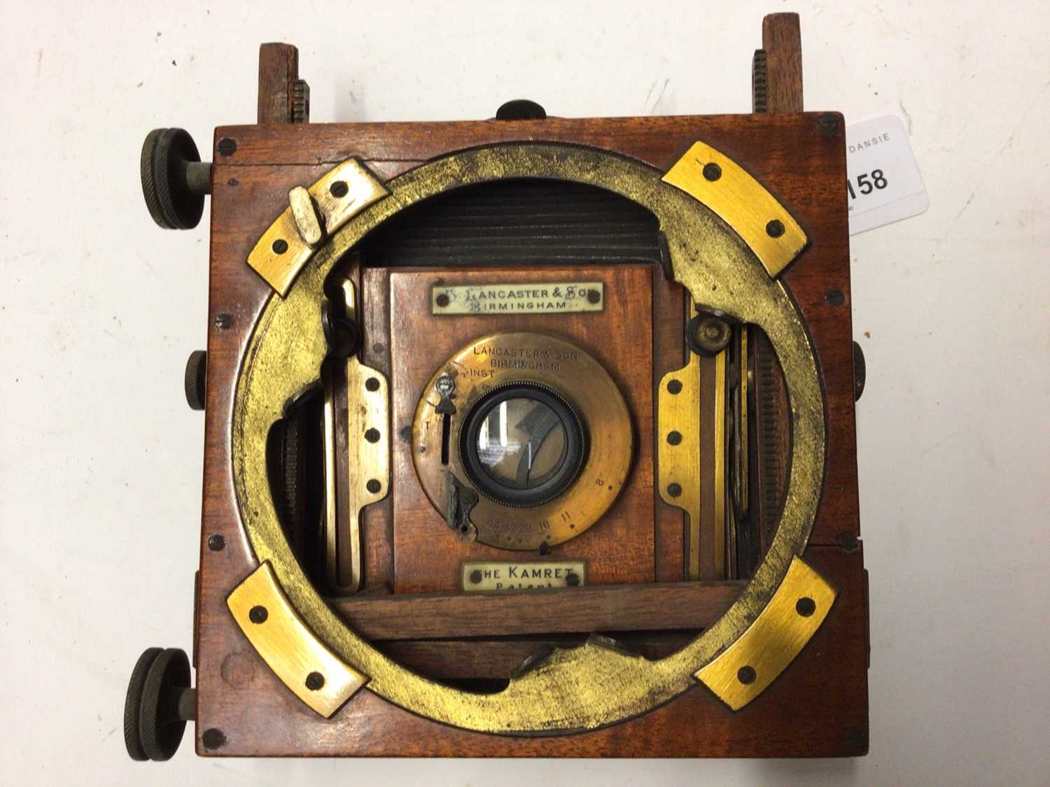 Lot 2708 - Good 19th century mahogany and brass bound plate camera by Lancaster & Sons, Birmingham.  Model 'The Kampet'