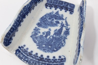 Lot 47 - Set of four 18th century Caughley blue and white Asparagus servers decorated in the Fisherman and Cormorant pattern (4)
