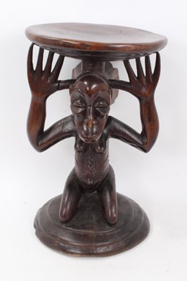 Lot 696 - African tribal carved wood figural stools