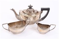 Lot 430 - Late Victorian three piece Edwardian silver...