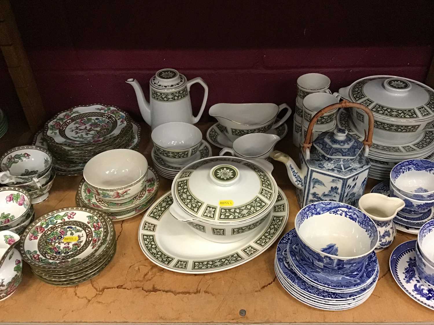 Lot 529 - Two shelves of ceramics, including early blue and white Willow pattern, Paragon 'Famous Roses' tea wares, Copeland Spode Italian, Coalport Indian Tree, etc