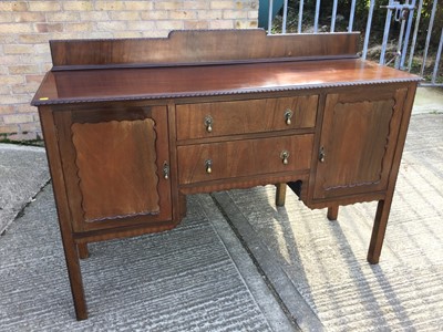 Lot 942 - 1920's Mahogany sideboard with two central draws, and cupboard to sides, ledge back and label to reverse 'F. S. Foster'