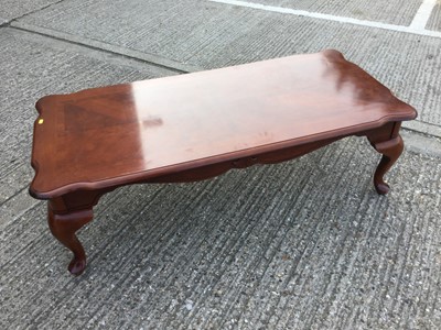 Lot 950 - Reproduction hardwood coffee table of rectangular form with cabriole legs