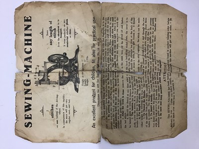 Lot 1879 - Miniature German  sewing machine and original instructions