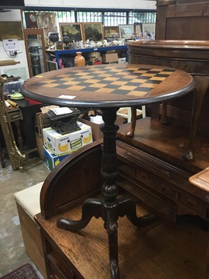 Lot 948 - Victorian walnut tripod games table with chess board top