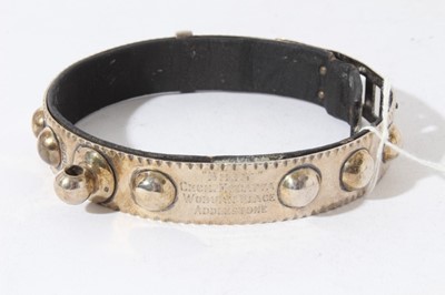 Lot 62 - George V silver dog collar with internal leather band, raised