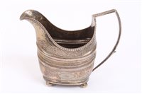 Lot 441 - George III Irish silver cream jug of helmet...