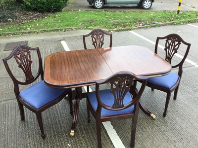 Lot 967 - Reproduction Georgian style mahogany extending dining table with one extra leaf, together with six chairs, comprising two carvers and four others