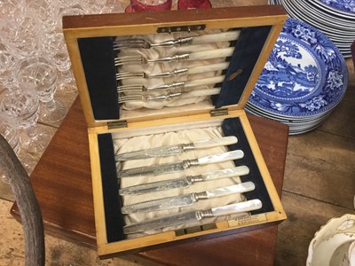 Lot 67 - Set of six silver handled tea knives in fitted case, set of twelve Edwardian silver plated fish knives and forks in fitted case and five fruit knives and forks