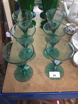 Lot 86 - Set of six Bristol green glass glasses together with six green amphora type bottles