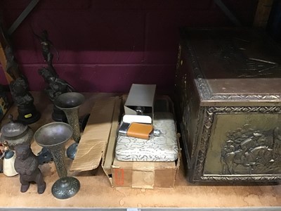 Lot 513 - An embossed brass log box, metal ware including Black Forest style money box and flatware