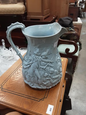 Lot 172 - Unusually large Victorian egg shell blue glazed jug, depicting a battle scene, 28cm high