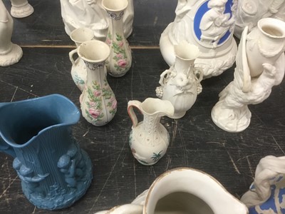 Lot 173 - Collection of Victorian Parian ware jugs, including signed example by W E Cobridge, and others, approximately 13