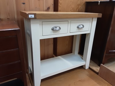 Lot 980 - Contemporary painted and light oak hall table with two drawers and undertier