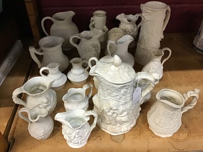 Lot 543 - Collection of Victorian relief moulded jugs. approximately 19