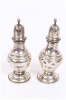 Lot 459 - Pair Edwardian silver pepperettes of baluster...