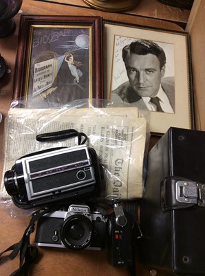 Lot 452 - Nikon SLR camera, Compact 400 cine camera, old newspapers, framed signed photograph of Donald Sinden and The Biograph framed advert